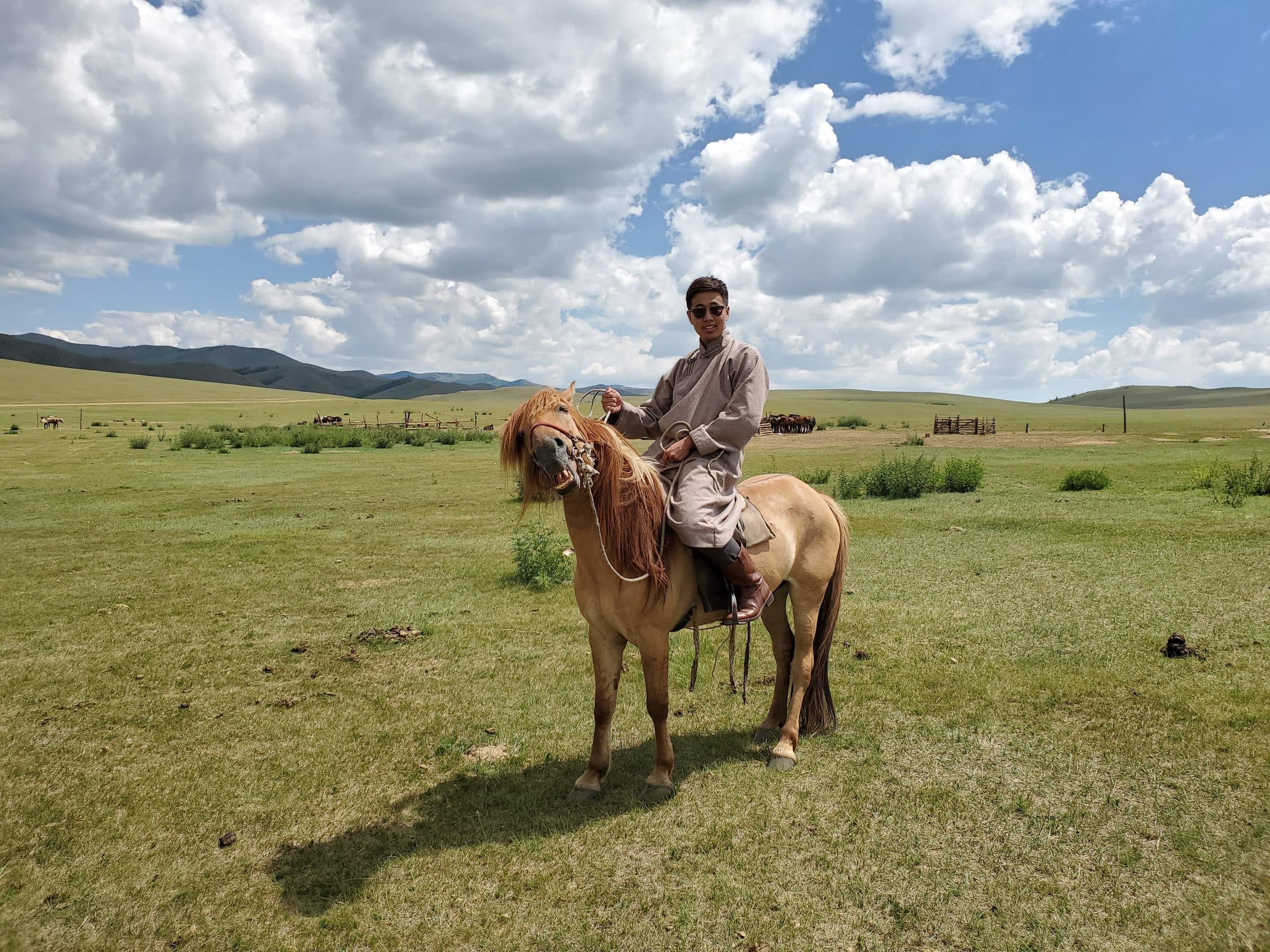 Tugi on horseback in the central Mongolian steppe